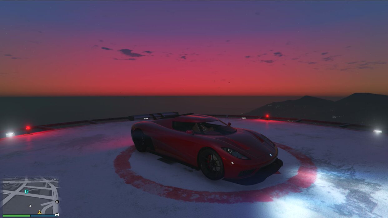 Supercar on a helipad at sunset